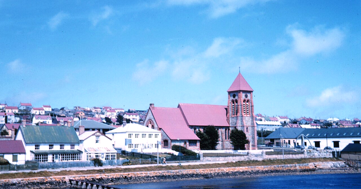 Port Stanley, Falkland Islands, viewed from the sea in December 1961. Photograph by Harley D. Nygren, NOAA At The Ends of the Earth Collection (corp1373). Public domain.