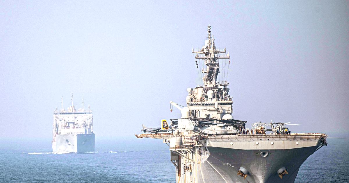 USS Essex transiting the Strait of Hormuz. Photograph by Sgt. Alexis Flores, U.S. Marine Corps, public domain.