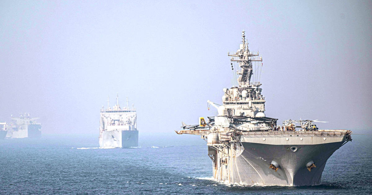 USS Essex transiting the Strait of Hormuz. Photograph by Sgt. Alexis Flores, U.S. Marine Corps, public domain.