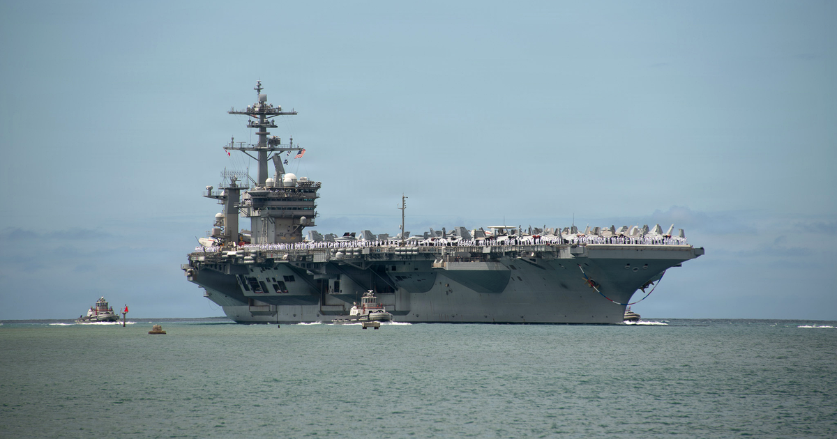 The aircraft carrier USS Theodore Roosevelt (CVN 71) arrives at Joint Base Pearl Harbor-Hickam, Hawaii, 23 June 2026. Photograph: U.S. Navy, Mass Communication Specialist 1st Class Erik Melgar, via Wikimedia Commons. Public domain.