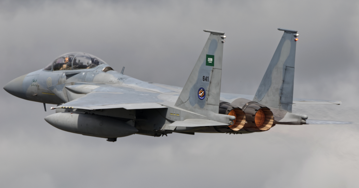 A Royal Saudi Air Force F-15SA Eagle fighter jet in flight against a grey sky, July 2024. Photograph: Ronnie Macdonald / Wikimedia Commons, CC BY 2.0.